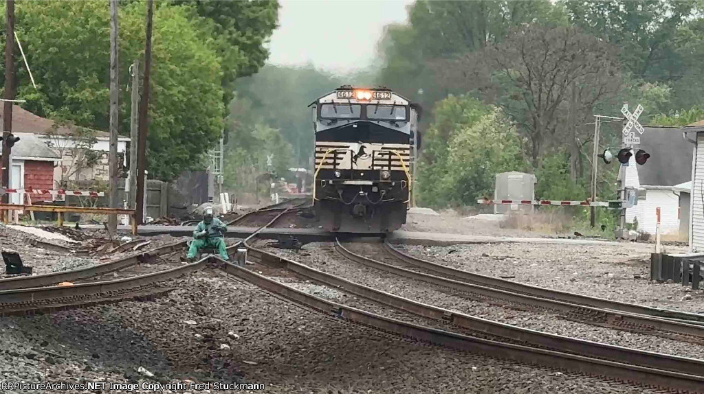 NS 4612 has passed and he grabs another welding rod.